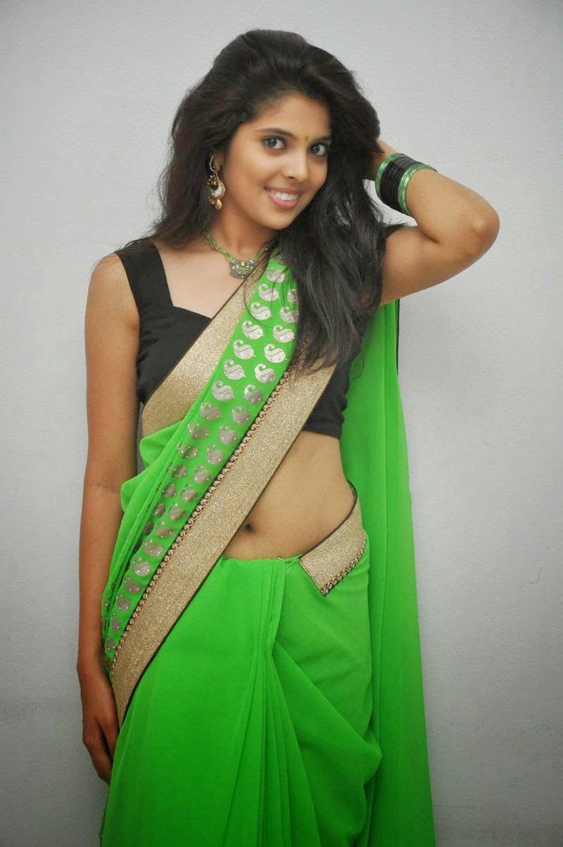 Shravya Sexy Navel And Cleavage Show In Green Saree Photoshoot Stills 19