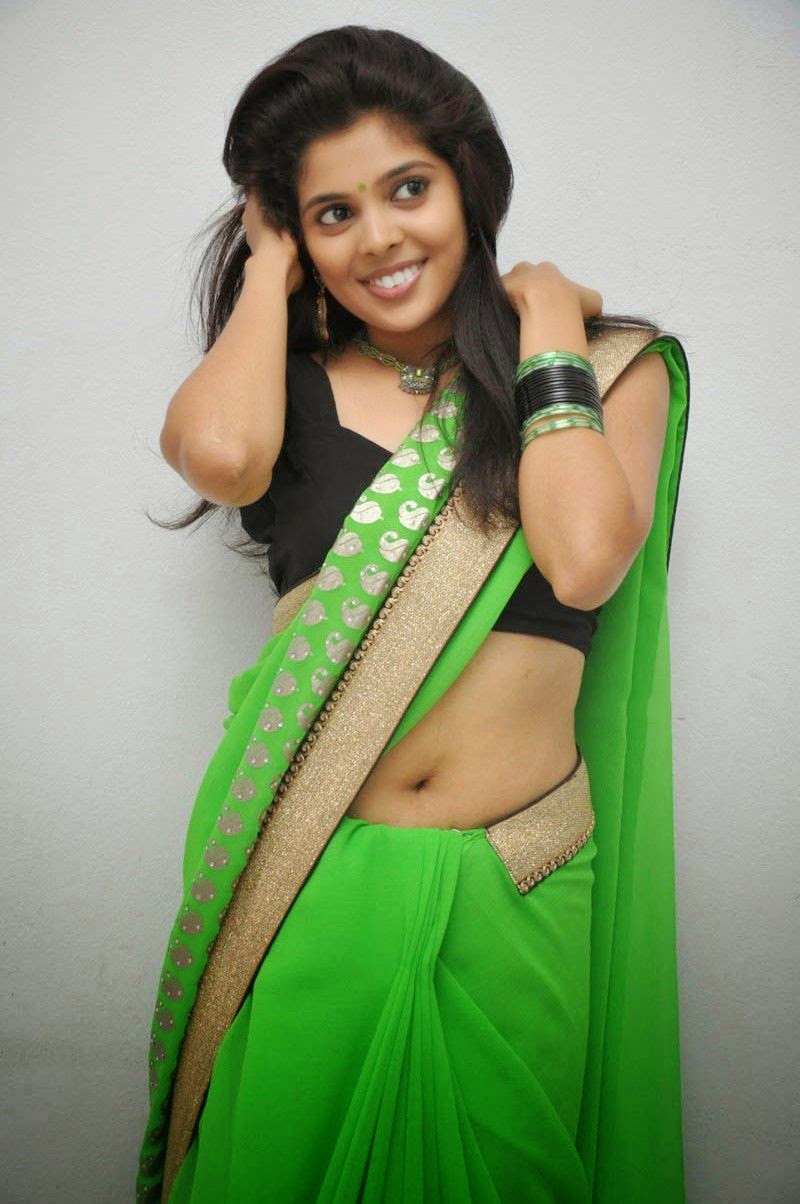 Shravya Sexy Navel And Cleavage Show In Green Saree Photoshoot Stills 41