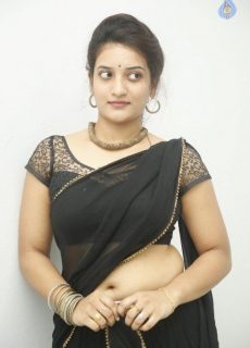 Actress Janani Reddy Hot Sexy Navel Show In Black Transparent Saree Photoshoot Stills