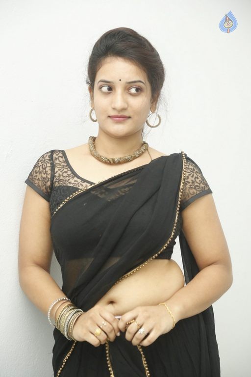 Actress Janani Reddy Hot Sexy Navel Show In Black Transparent Saree Photoshoot Stills 61