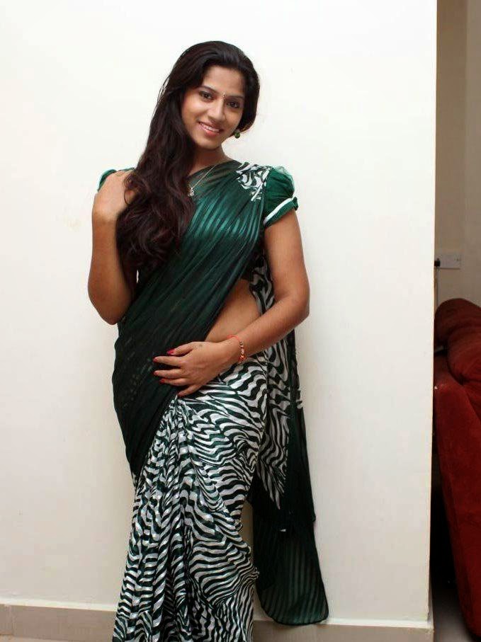 Actress Meenal Aunty Hot Sexy Navel Show In Transparent Saree Photos 19