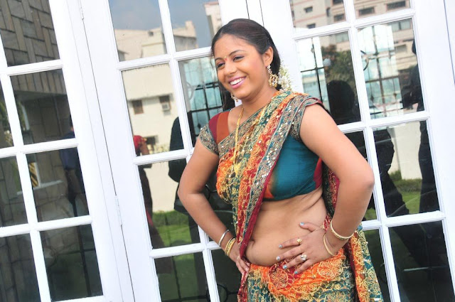 Actress Sunakshi Hot Sexy Navel Show In Saree Spicy Photoshoot Stills 19