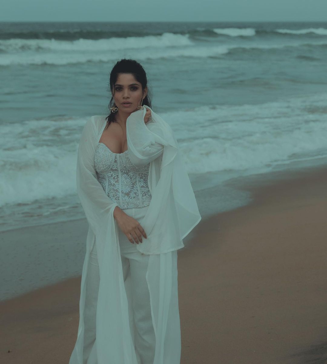 Actress Divya Bharathi Hot Sexy Cleavage Show In Beach Photoshoot Stills 15