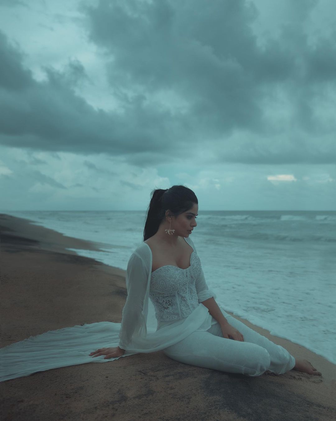 Actress Divya Bharathi Hot Sexy Cleavage Show In Beach Photoshoot Stills 1F