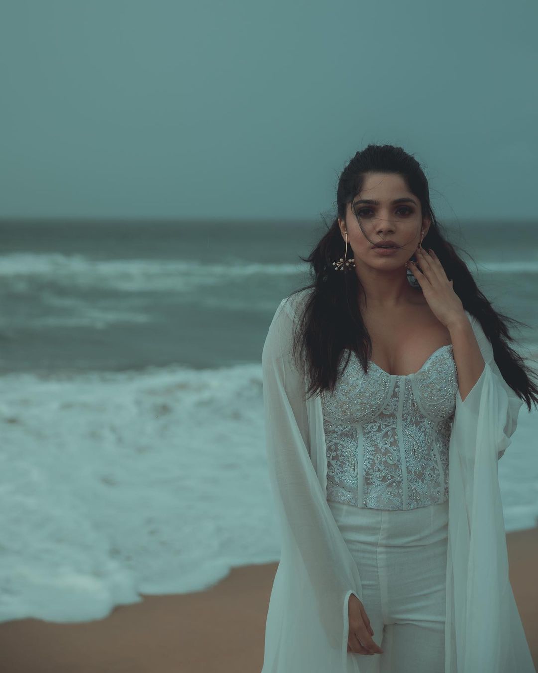 Actress Divya Bharathi Hot Sexy Cleavage Show In Beach Photoshoot Stills 29