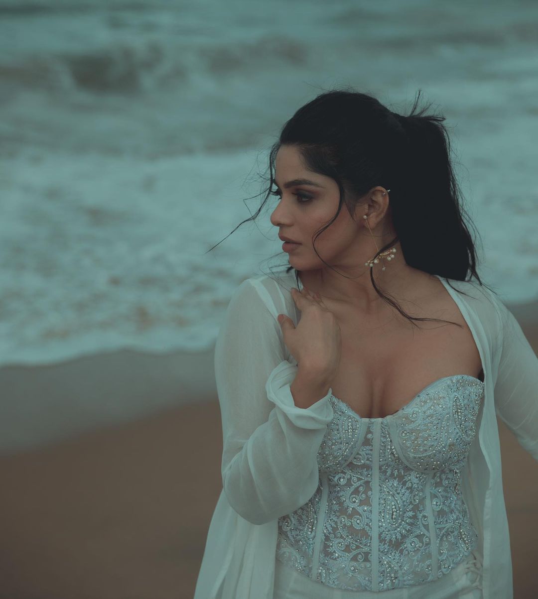 Actress Divya Bharathi Hot Sexy Cleavage Show In Beach Photoshoot Stills 33