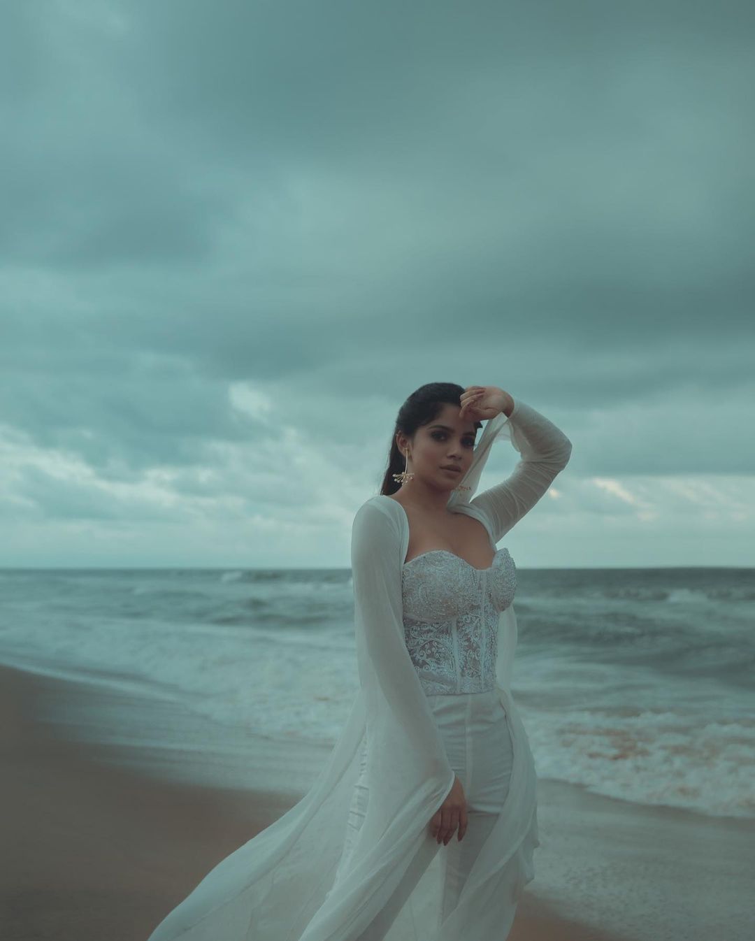 Actress Divya Bharathi Hot Sexy Cleavage Show In Beach Photoshoot Stills 47
